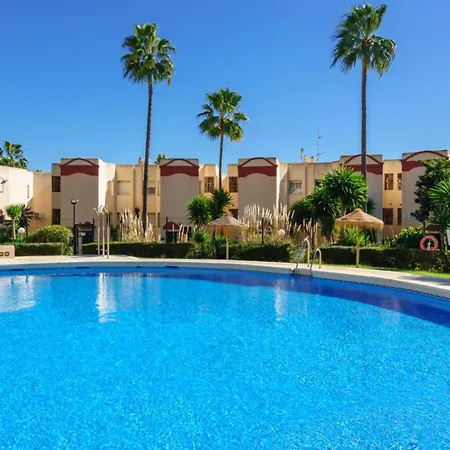Riviera Charm: 2br Retreat With Terrace Pool