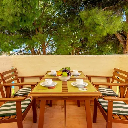 Riviera Charm: 2br Retreat With Terrace Pool